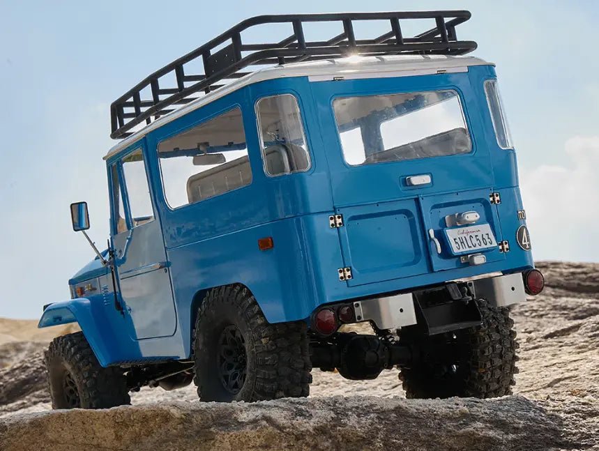 Auto a Control Remoto - 1/10 Toyota Land Cruiser FJ40 - FMS Amarillo o Azul - Jugueteria del Sur