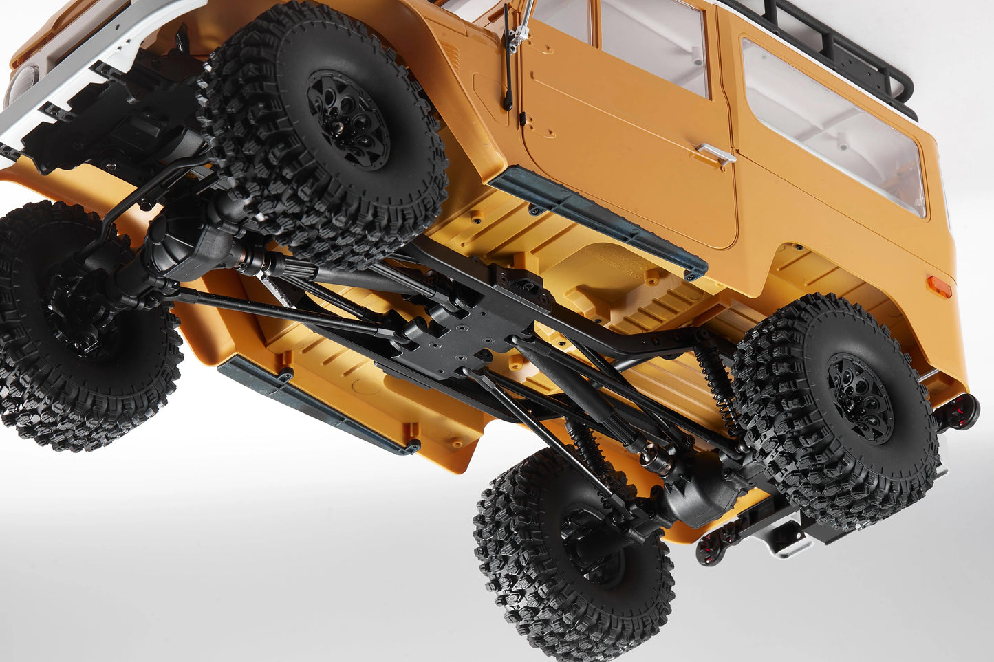Auto a Control Remoto - 1/10 Toyota Land Cruiser FJ40 - FMS Amarillo o Azul - Jugueteria del Sur