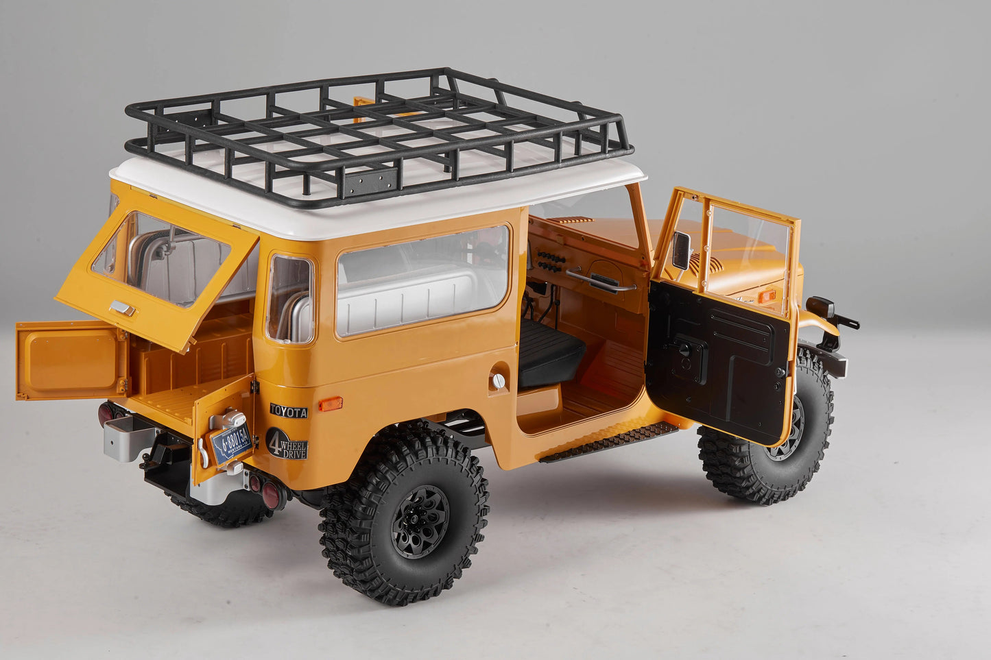 Auto a Control Remoto - 1/10 Toyota Land Cruiser FJ40 - FMS Amarillo o Azul - Jugueteria del Sur