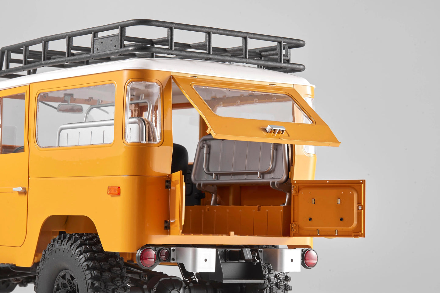 Auto a Control Remoto - 1/10 Toyota Land Cruiser FJ40 - FMS Amarillo o Azul - Jugueteria del Sur