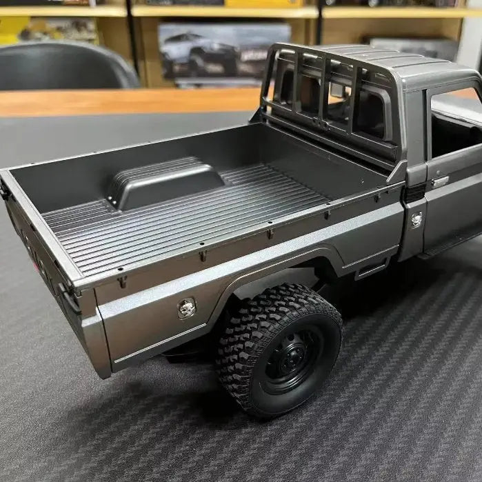 Auto a Control Remoto - 1/12 Camioneta TOYOTA Land Cruiser - MN82 PRO Gris MN Model