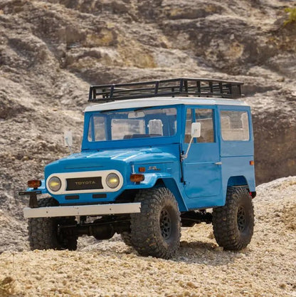 Auto a Control Remoto - 1/10 Toyota Land Cruiser FJ40 - FMS Amarillo o Azul - Jugueteria del Sur