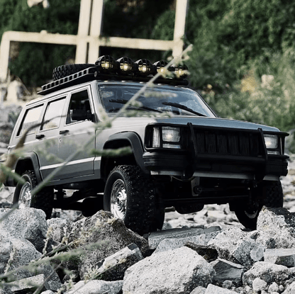 Auto a Control Remoto - 1/12 Jeep Cherokee XJ - MN78 Gris o Azul - Jugueteria del Sur