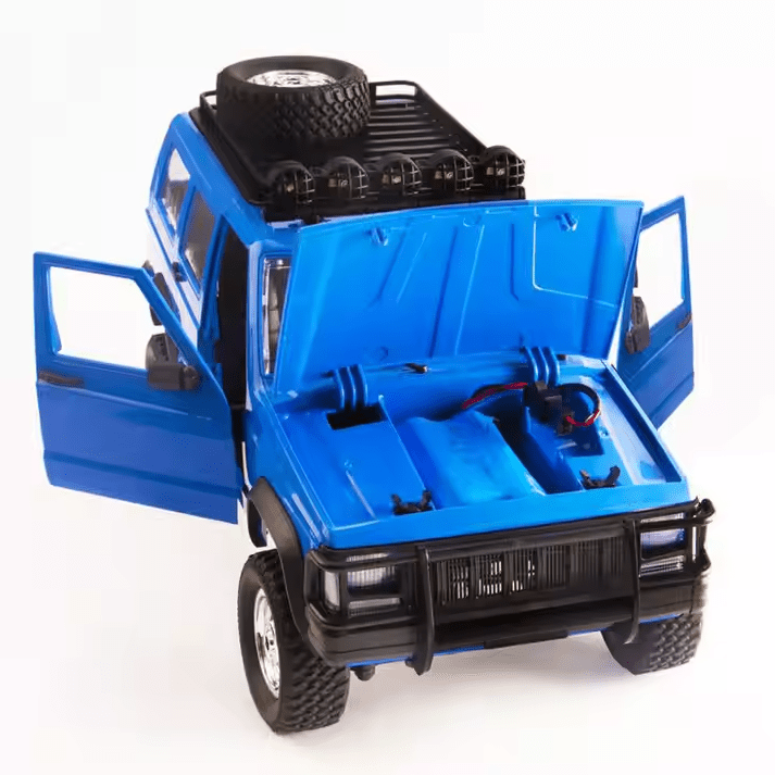 Auto a Control Remoto - 1/12 Jeep Cherokee XJ - MN78 Gris o Azul - Jugueteria del Sur