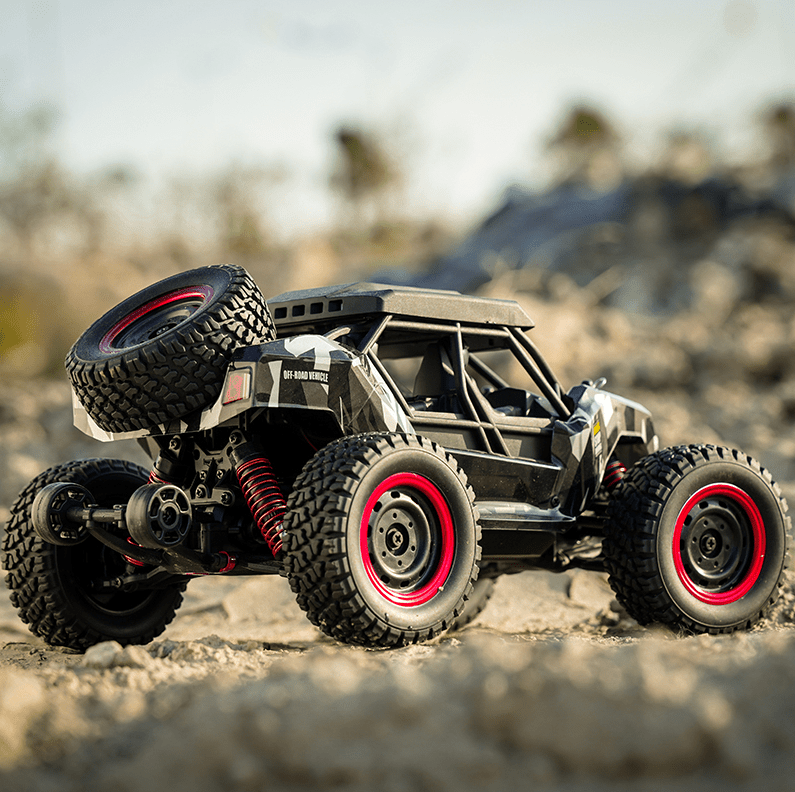 Auto a Control Remoto - 1/16 Adventurer Buggy - SCY 16106 Gris o Rojo - Jugueteria del Sur