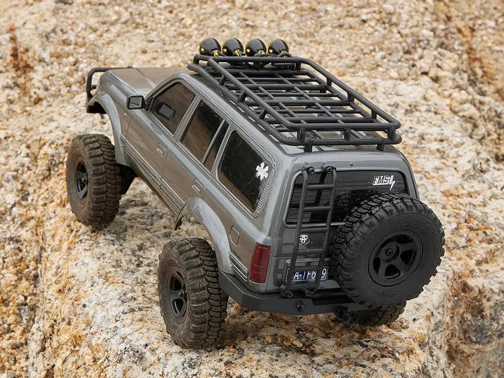 Auto a Control Remoto - 1/18 TOYOTA Land Cruiser 80 - FMS FCX18 LC80 V2 Gris o Amarillo o Azul - Jugueteria del Sur