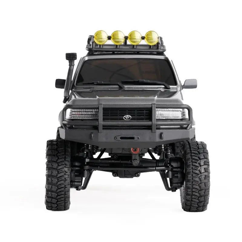Auto a Control Remoto - 1/18 TOYOTA Land Cruiser 80 - FMS FCX18 LC80 V2 Gris o Amarillo o Azul - Jugueteria del Sur