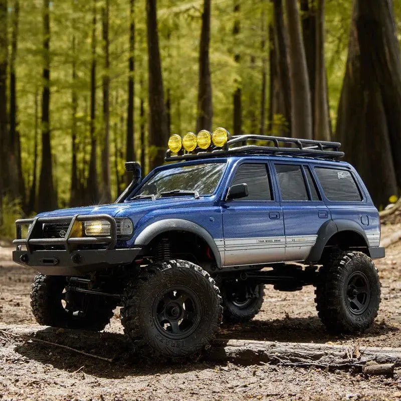 Auto a Control Remoto - 1/18 TOYOTA Land Cruiser 80 - FMS FCX18 LC80 V2 Gris o Amarillo o Azul - Jugueteria del Sur