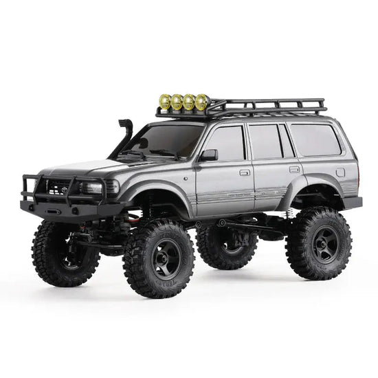 Auto a Control Remoto - 1/18 TOYOTA Land Cruiser 80 - FMS FCX18 LC80 V2 Gris o Amarillo o Azul - Jugueteria del Sur