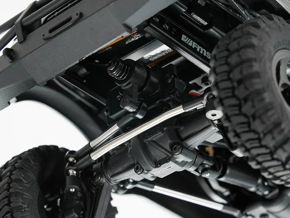 Auto a Control Remoto - 1/18 TOYOTA Land Cruiser 80 - FMS FCX18 LC80 V2 Gris o Amarillo o Azul - Jugueteria del Sur