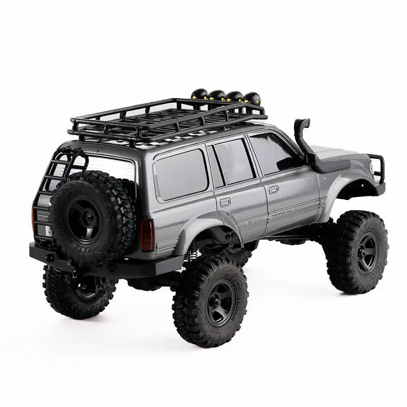 Auto a Control Remoto - 1/18 TOYOTA Land Cruiser 80 - FMS FCX18 LC80 V2 Gris o Amarillo o Azul - Jugueteria del Sur