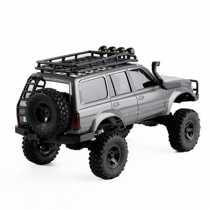 Auto a Control Remoto - 1/18 TOYOTA Land Cruiser 80 - FMS FCX18 LC80 V2 Gris o Amarillo o Azul - Jugueteria del Sur